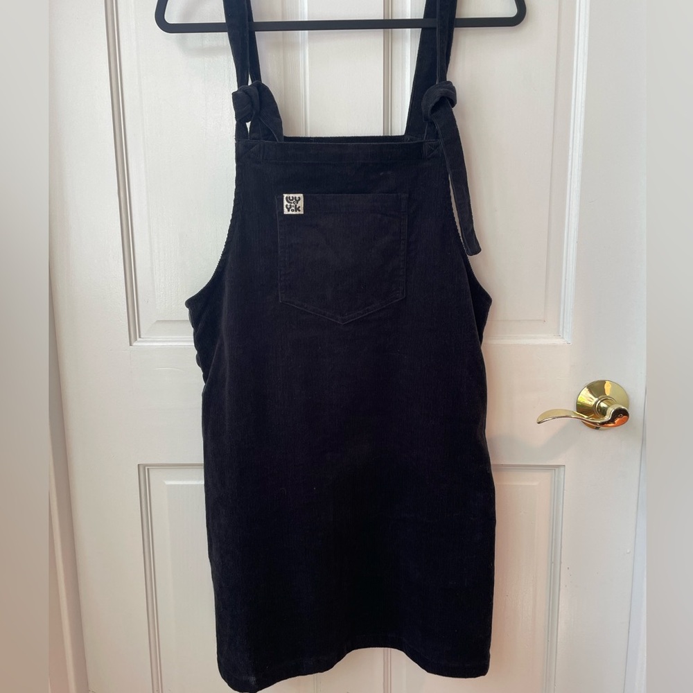 Lucy & Yak pinafore mini dress in black corduroy